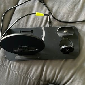 Charging station.   Phone, watch, AirPods.  Excellent condition.  Works great.
